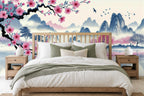 blue cherry blossom tree wallpaper in a bedroom
