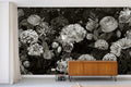 black and white floral wallpaper in a living room